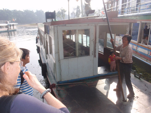 Our boat and Captain, she's operating the anchor.